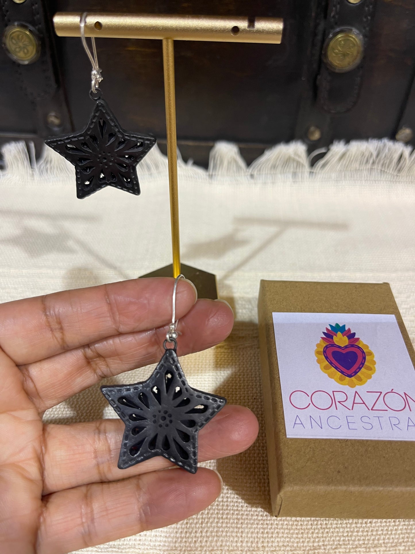 Black star earrings